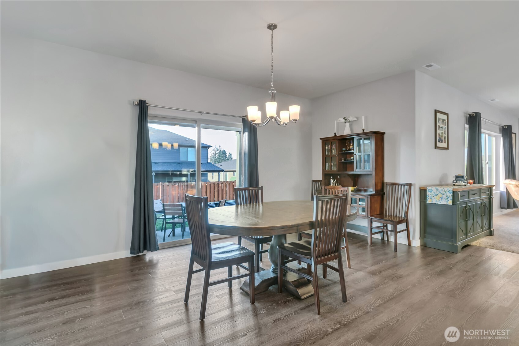 291 South Sergeant Street Buckley, WA 98321 - Photo 15 of 38 a view of a dining room with furniture window and wooden floor