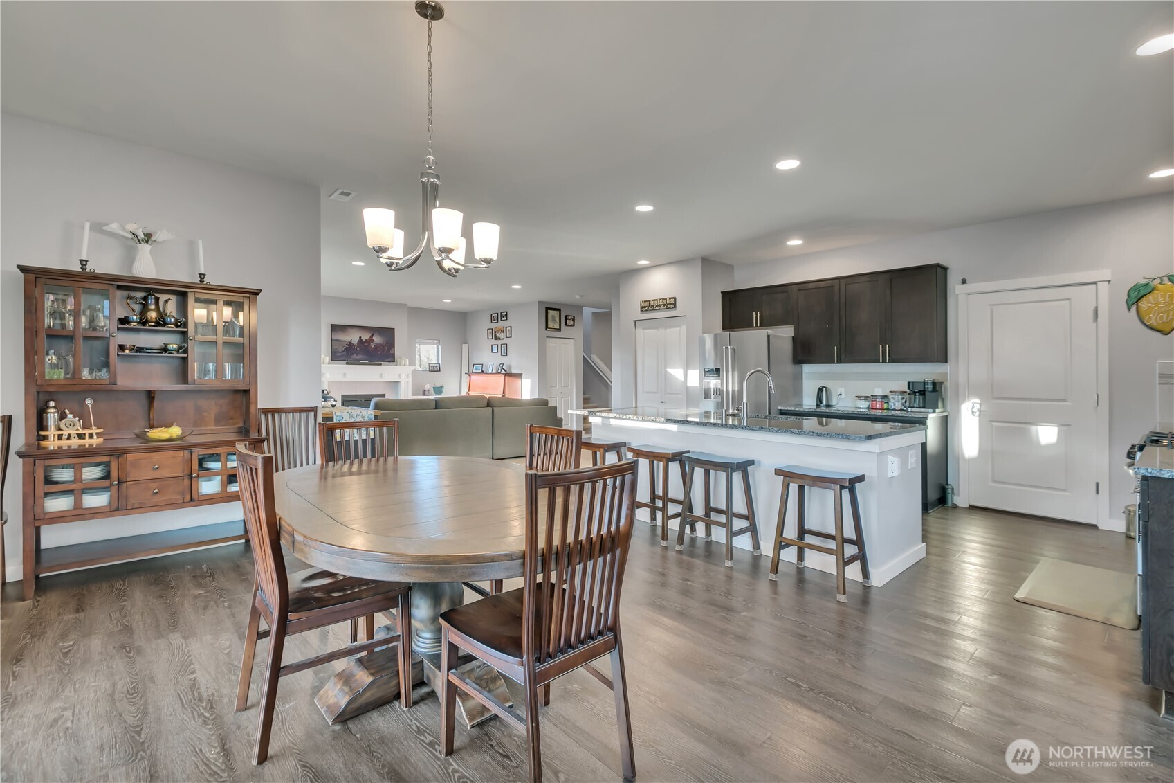291 South Sergeant Street Buckley, WA 98321 - Photo 16 of 38 a view of a dining room with furniture and wooden floor