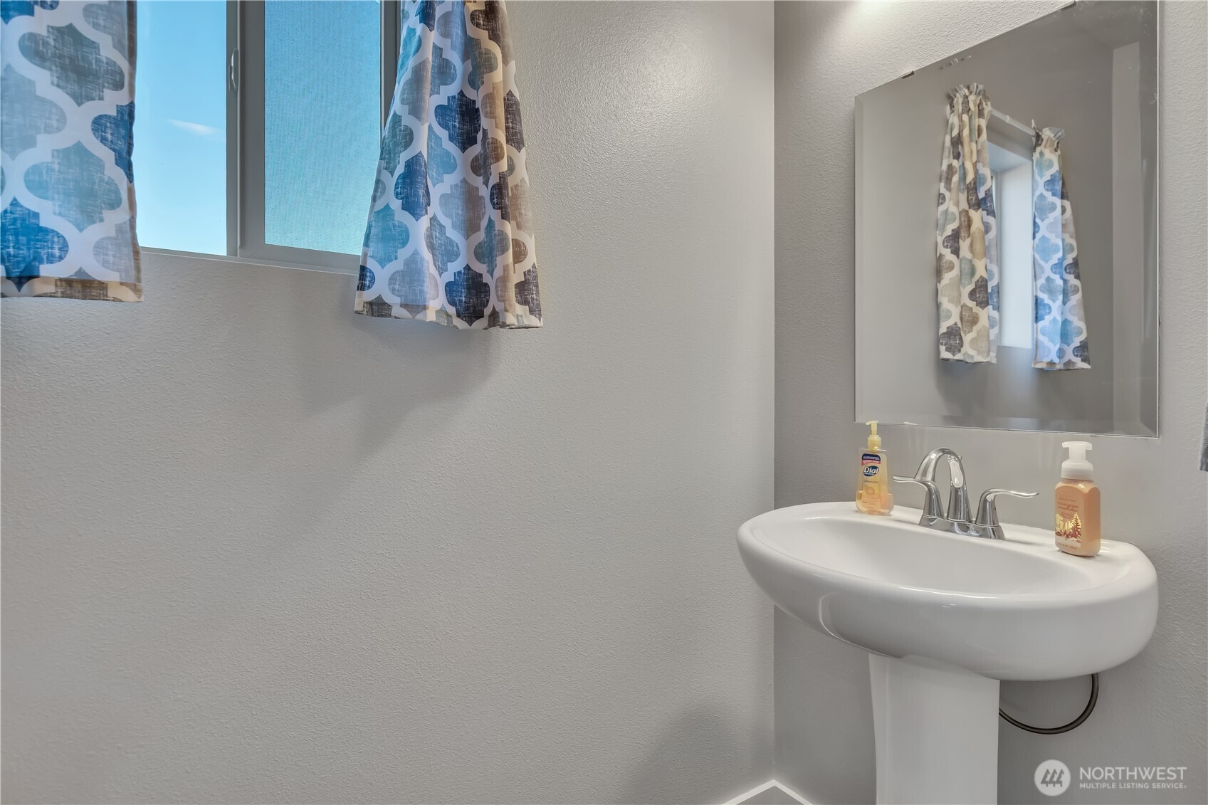 291 South Sergeant Street Buckley, WA 98321 - Photo 17 of 38 a bathroom with a sink and toilet