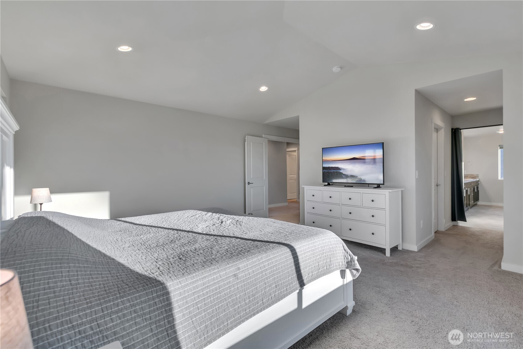 291 South Sergeant Street Buckley, WA 98321 - Photo 20 of 38 a spacious bedroom with a bed and a flat screen tv
