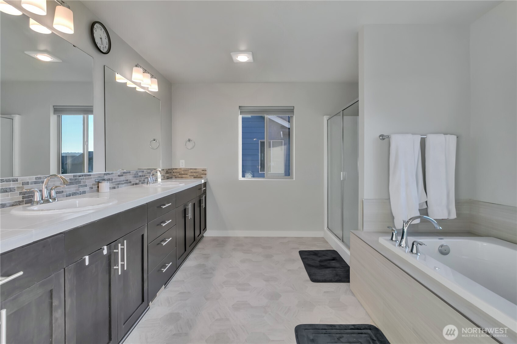 291 South Sergeant Street Buckley, WA 98321 - Photo 21 of 38 a bathroom with a double vanity sink and a mirror