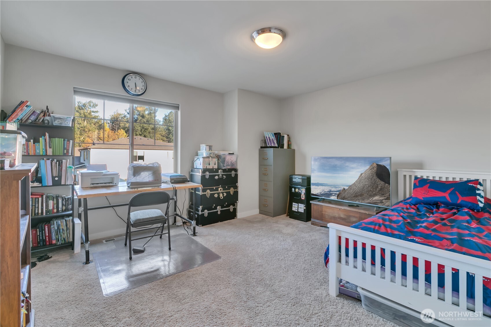 291 South Sergeant Street Buckley, WA 98321 - Photo 27 of 38 a bedroom with furniture and a window