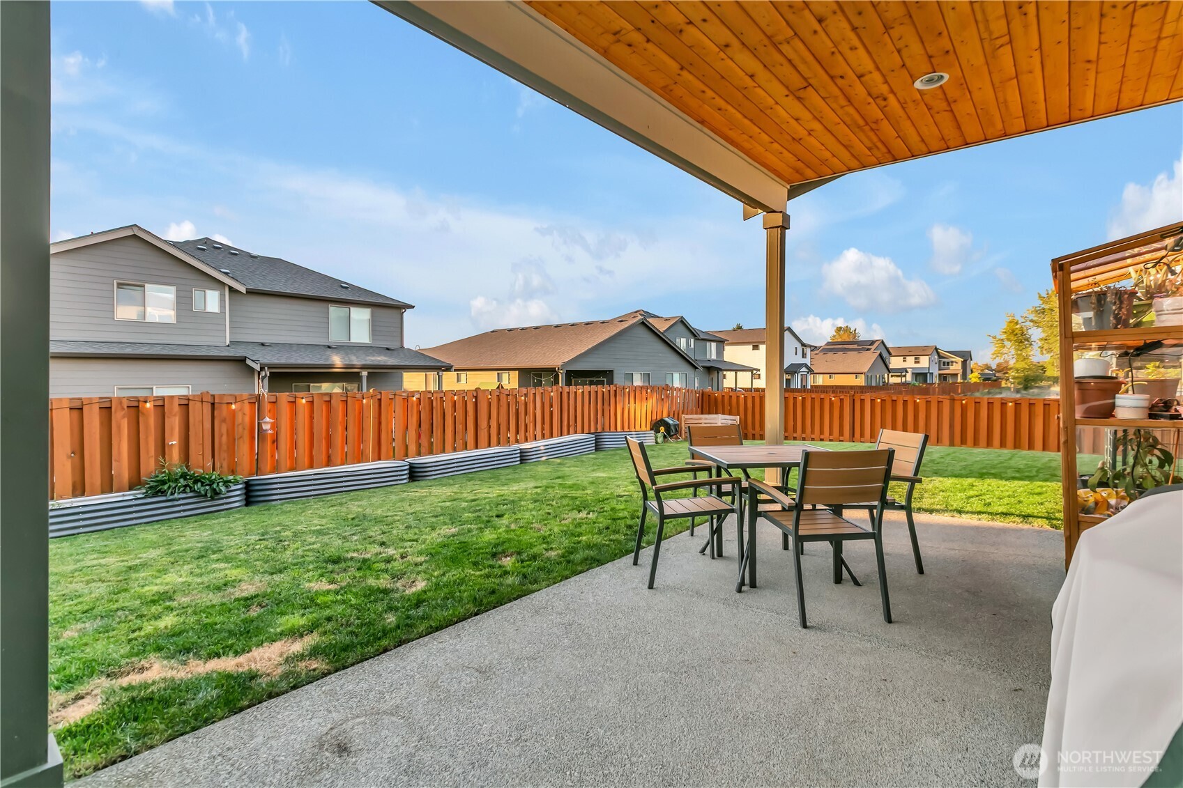 291 South Sergeant Street Buckley, WA 98321 - Photo 29 of 38 a view of a house with backyard and a sitting area