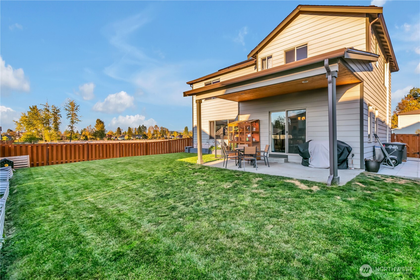 291 South Sergeant Street Buckley, WA 98321 - Photo 30 of 38 a view of a backyard with plants and a patio