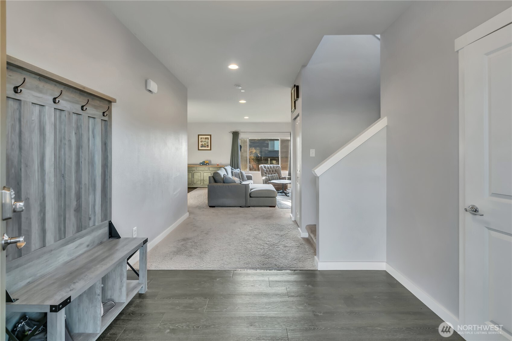 291 South Sergeant Street Buckley, WA 98321 - Photo 5 of 38 a view of a living room with furniture and wooden floor