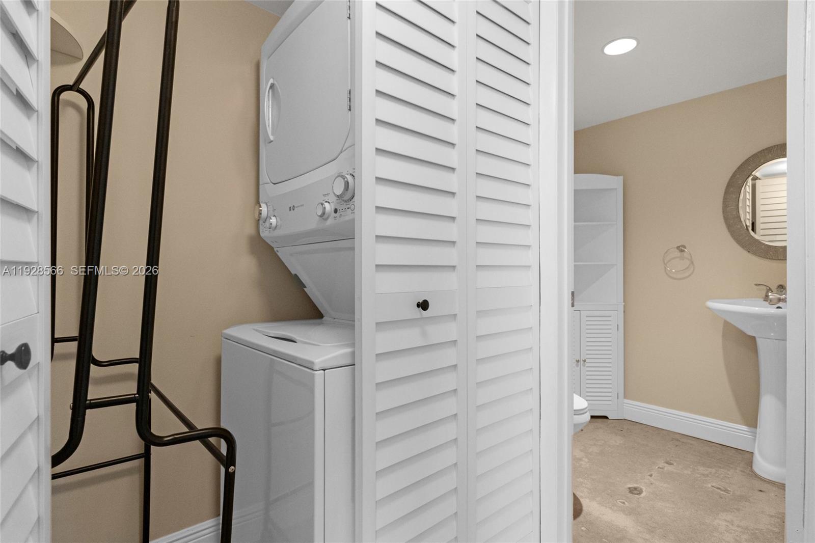 4714 Southwest 67th Avenue, Unit C1 Miami, FL 33155 - Photo 16 of 37 a view of walk in closet