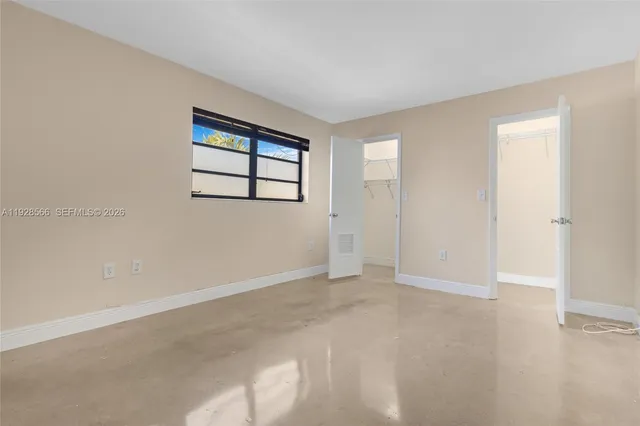 an empty room with an entryway