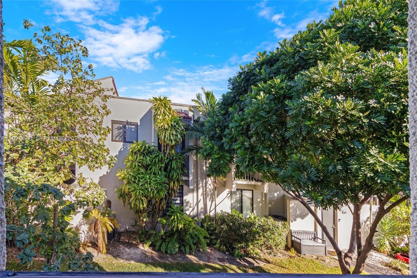 4714 Southwest 67th Avenue, Unit C1 Miami, FL 33155 - Photo 26 of 37 a picture of street view