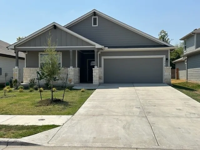 a front view of house with yard