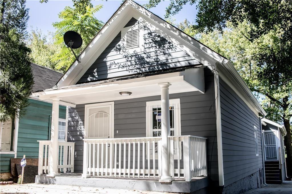 911 Smith Street Southwest Atlanta, GA 30310 - Photo 1 of 13 a front view of a house with plants