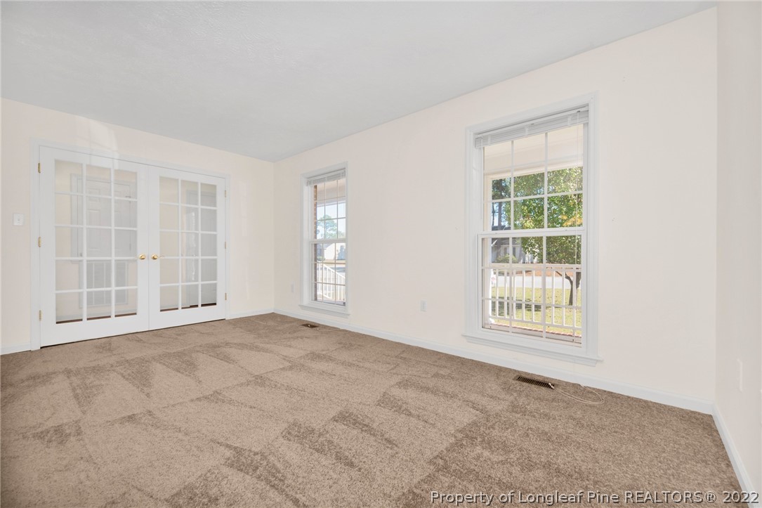365 Sawyer Road Cameron, NC 28326 - Photo 8 of 37 an empty room with windows