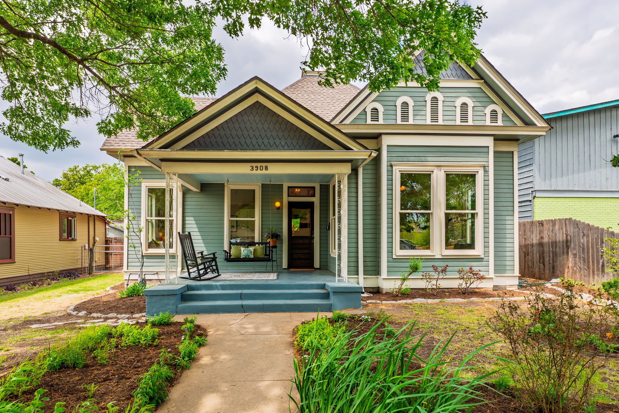 a front view of a house with garden