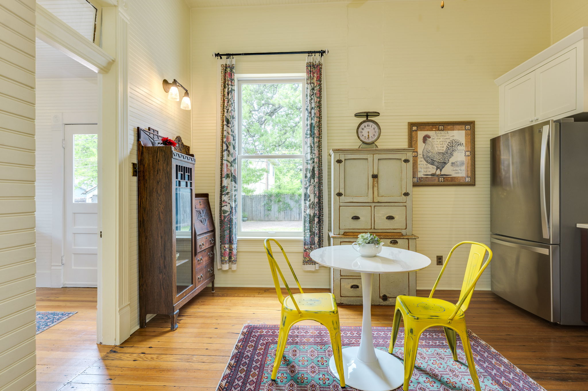 3908 Avenue D Austin, TX 78751 - Photo 12 of 26 a view of a dining room with furniture and a window