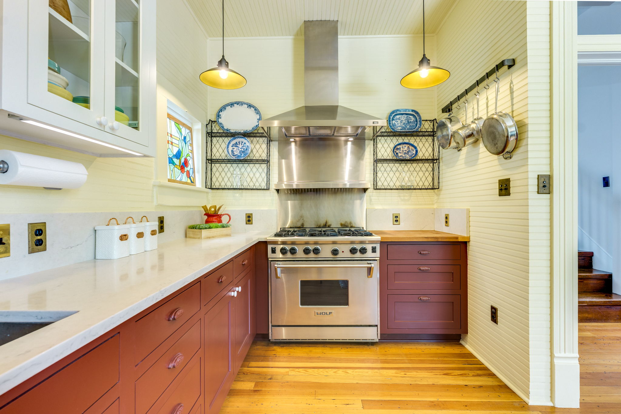3908 Avenue D Austin, TX 78751 - Photo 13 of 26 a kitchen with stainless steel appliances granite countertop a sink and cabinets