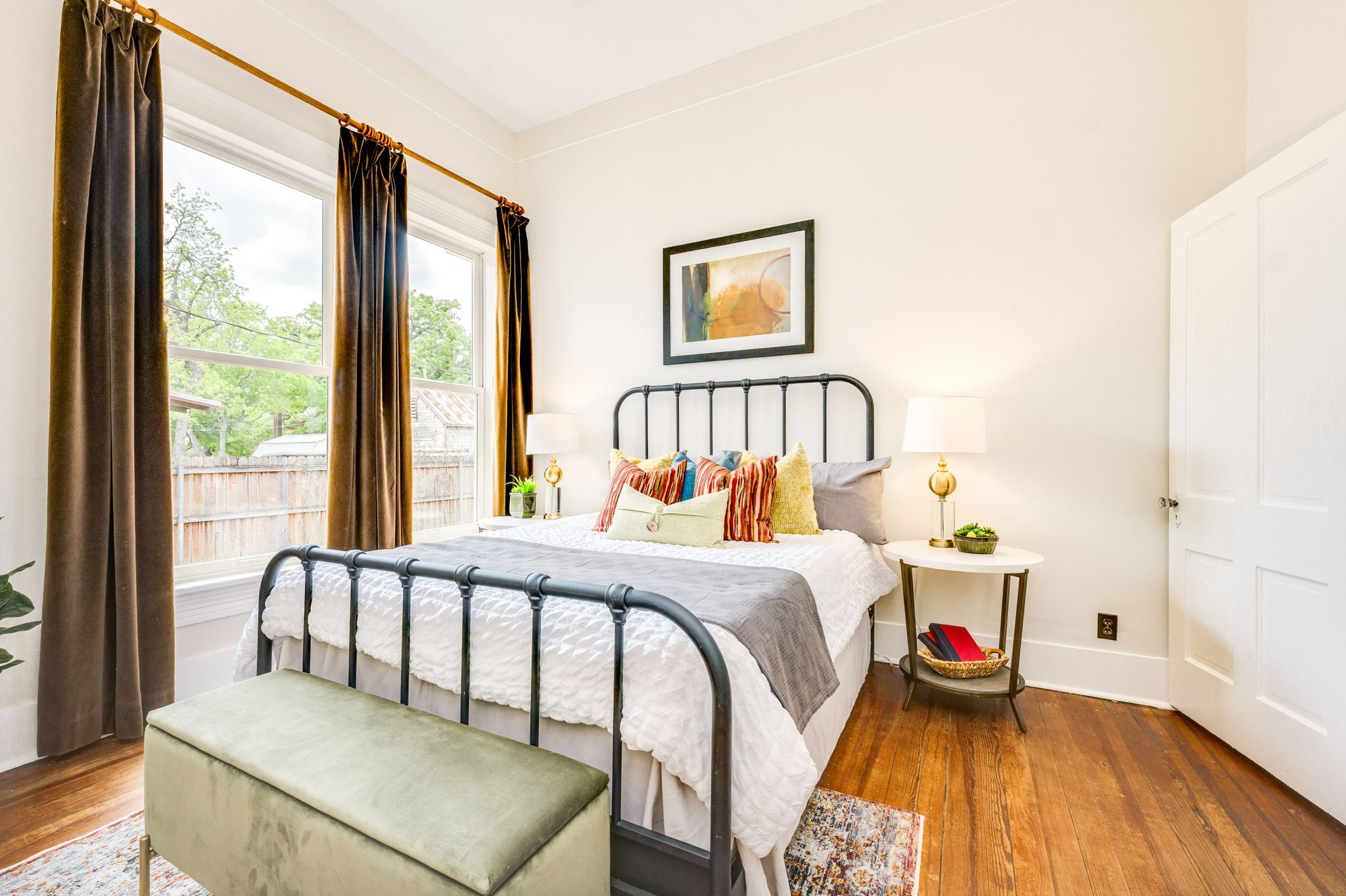 3908 Avenue D Austin, TX 78751 - Photo 16 of 26 a bedroom with a bed and a window