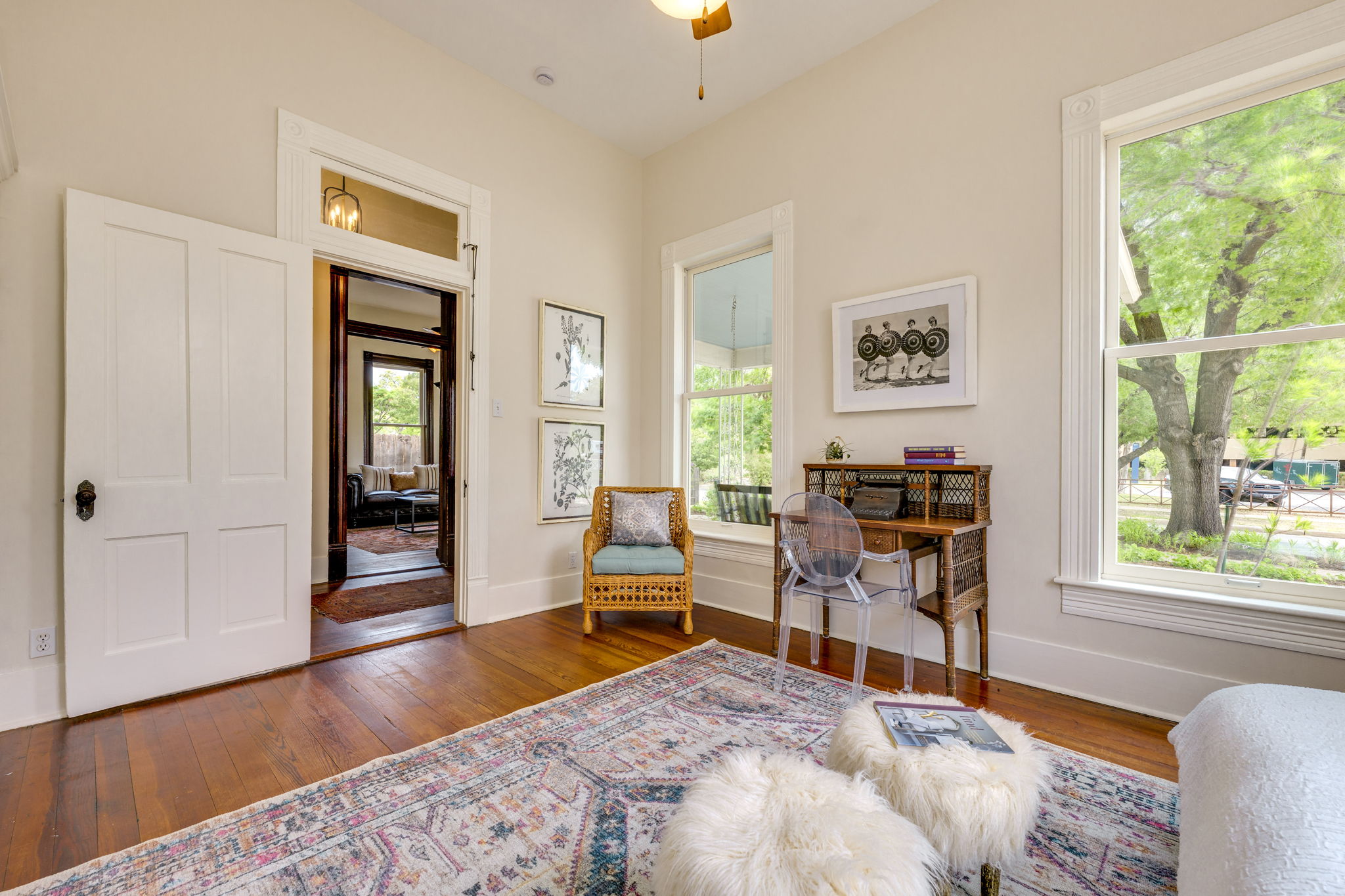 3908 Avenue D Austin, TX 78751 - Photo 20 of 26 a bedroom with a bed and large windows