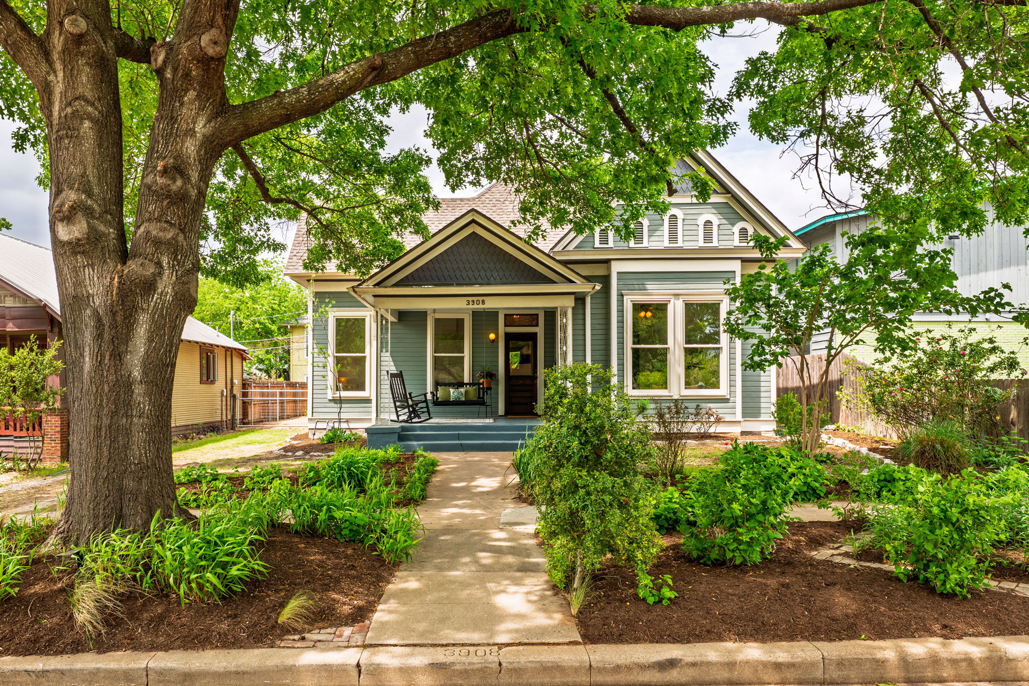 3908 Avenue D Austin, TX 78751 - Photo 2 of 26 a front view of a house with a yard