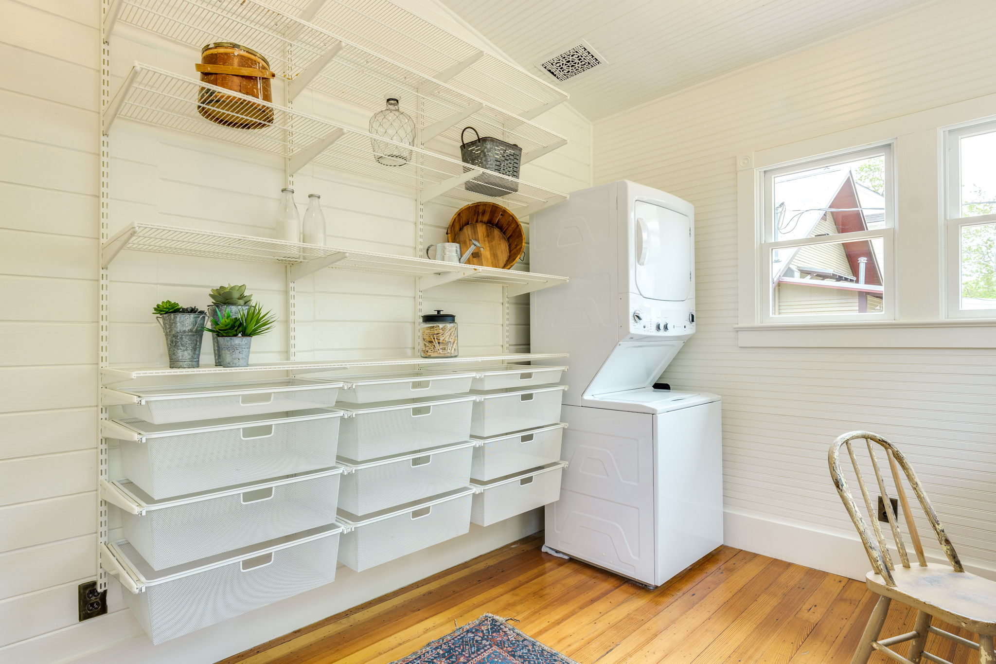 3908 Avenue D Austin, TX 78751 - Photo 23 of 26 a view of kitchen with cabinets and wooden floor