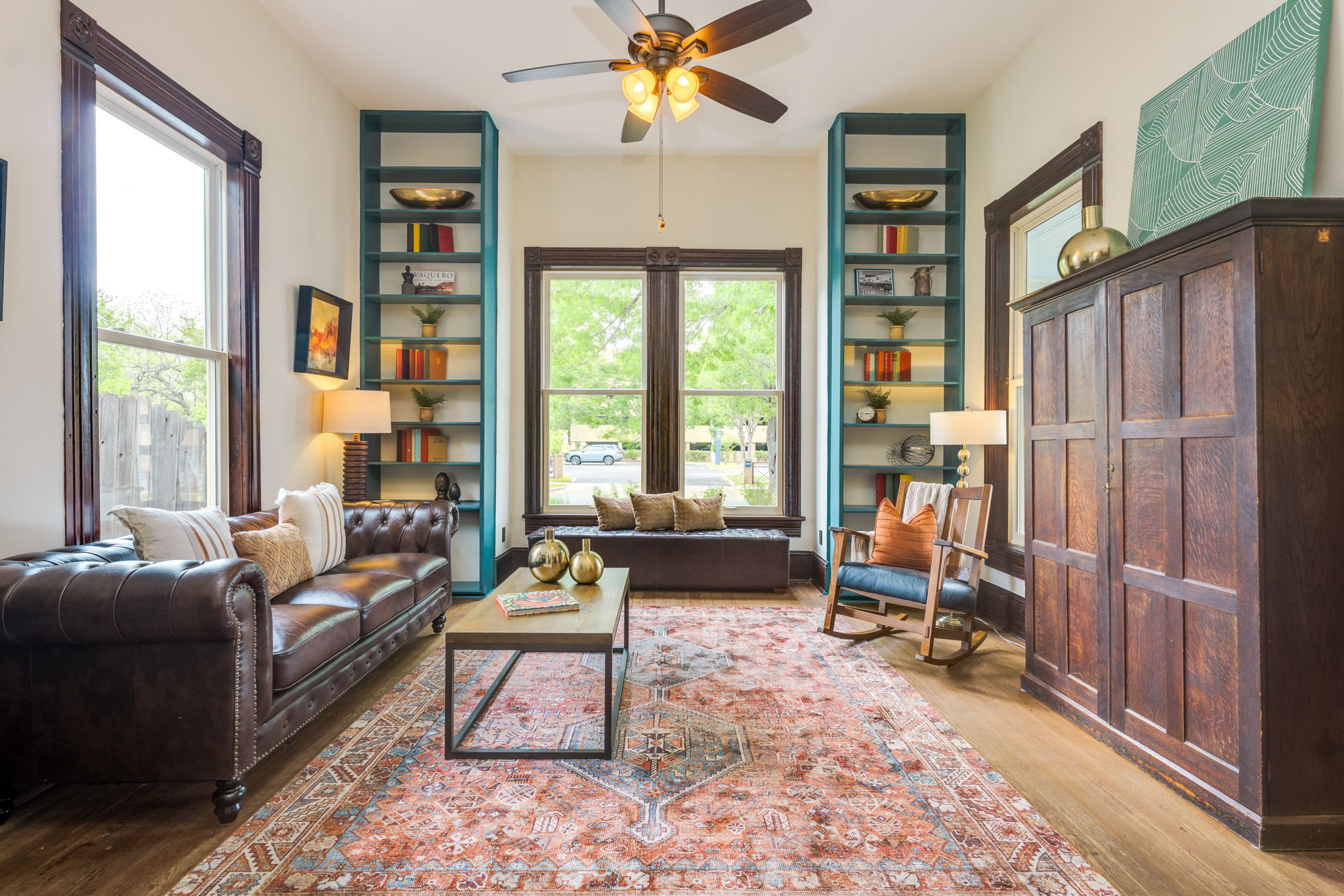 3908 Avenue D Austin, TX 78751 - Photo 5 of 26 a living room with furniture a large window and a rug