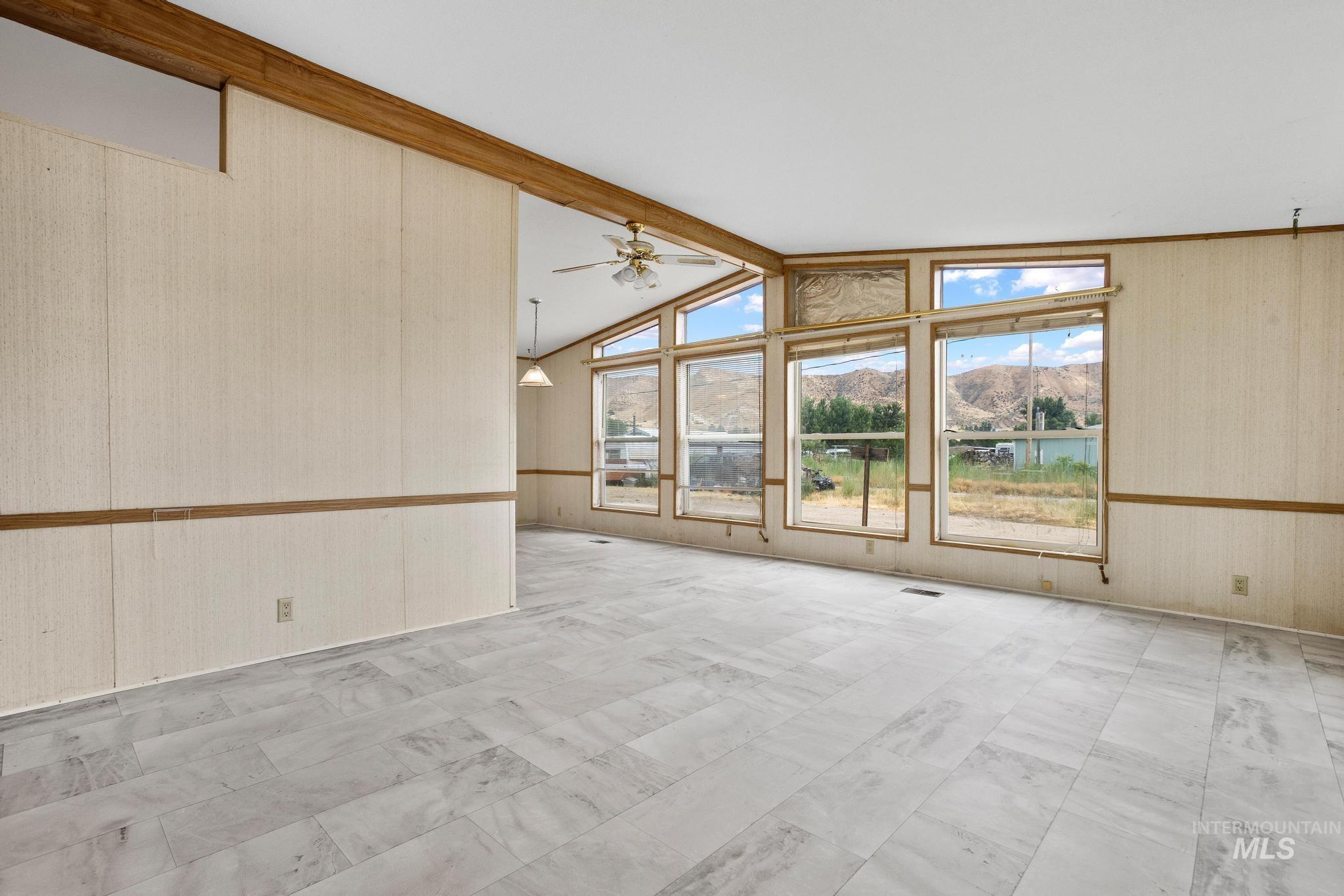 3680 South Mill Road Emmett, ID 83617 - Photo 12 of 38 Bright interior featuring an array of windows providing expansive outdoor scenery