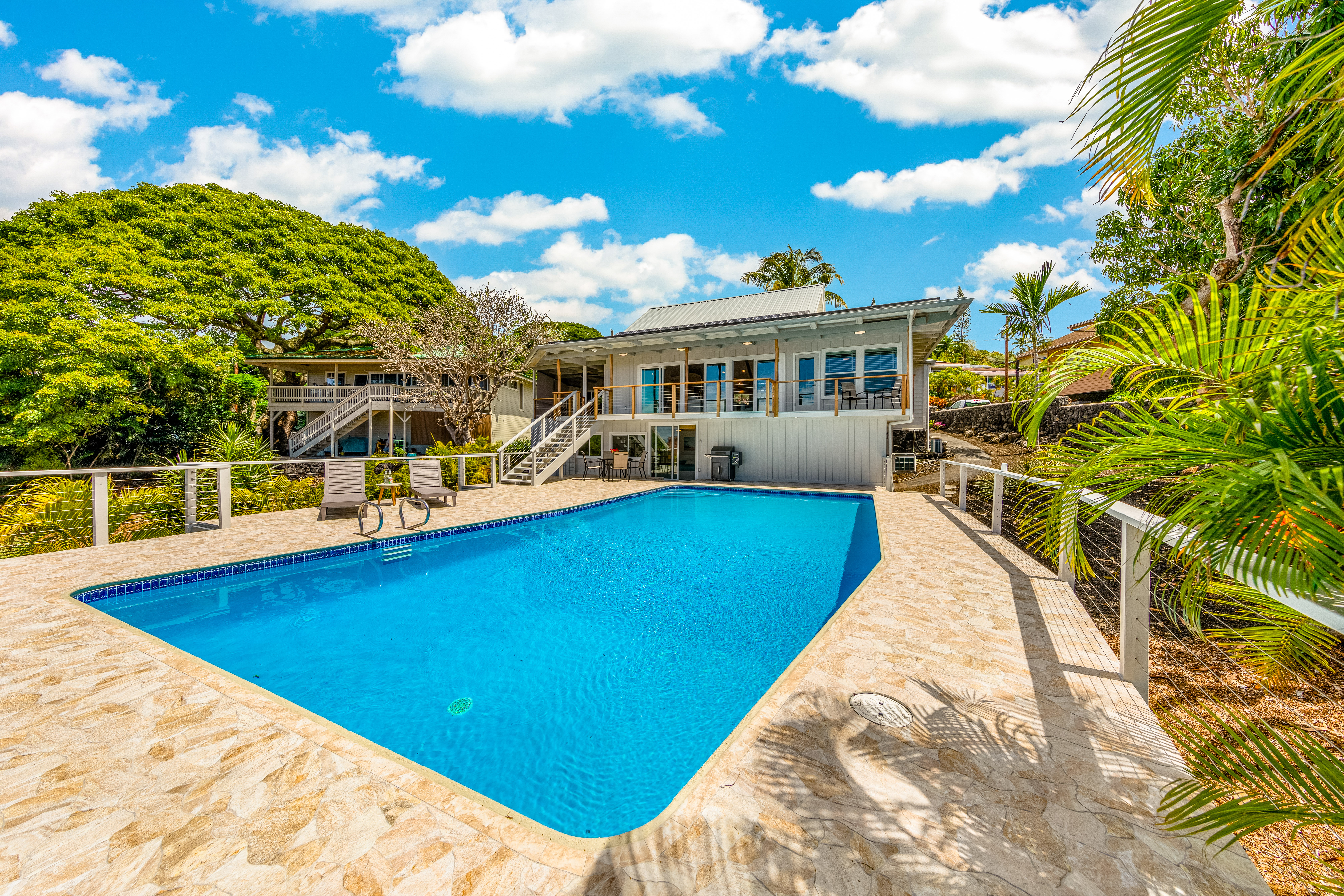 77-6472 Kilohana Street Kailua-Kona, HI 96740 - Photo 17 of 29 a view of a house with a backyard