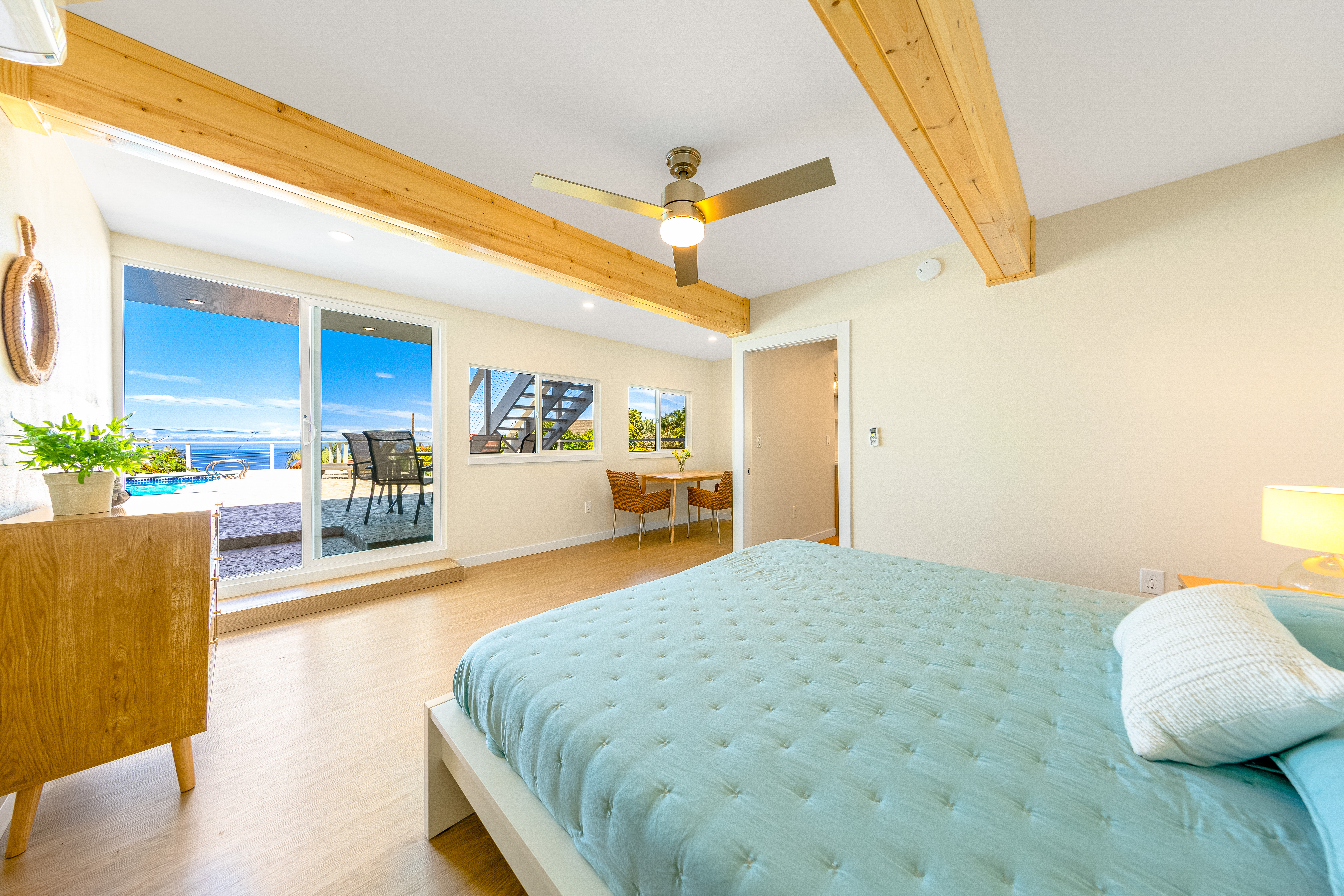 77-6472 Kilohana Street Kailua-Kona, HI 96740 - Photo 18 of 29 a bedroom with a bed and a potted plant