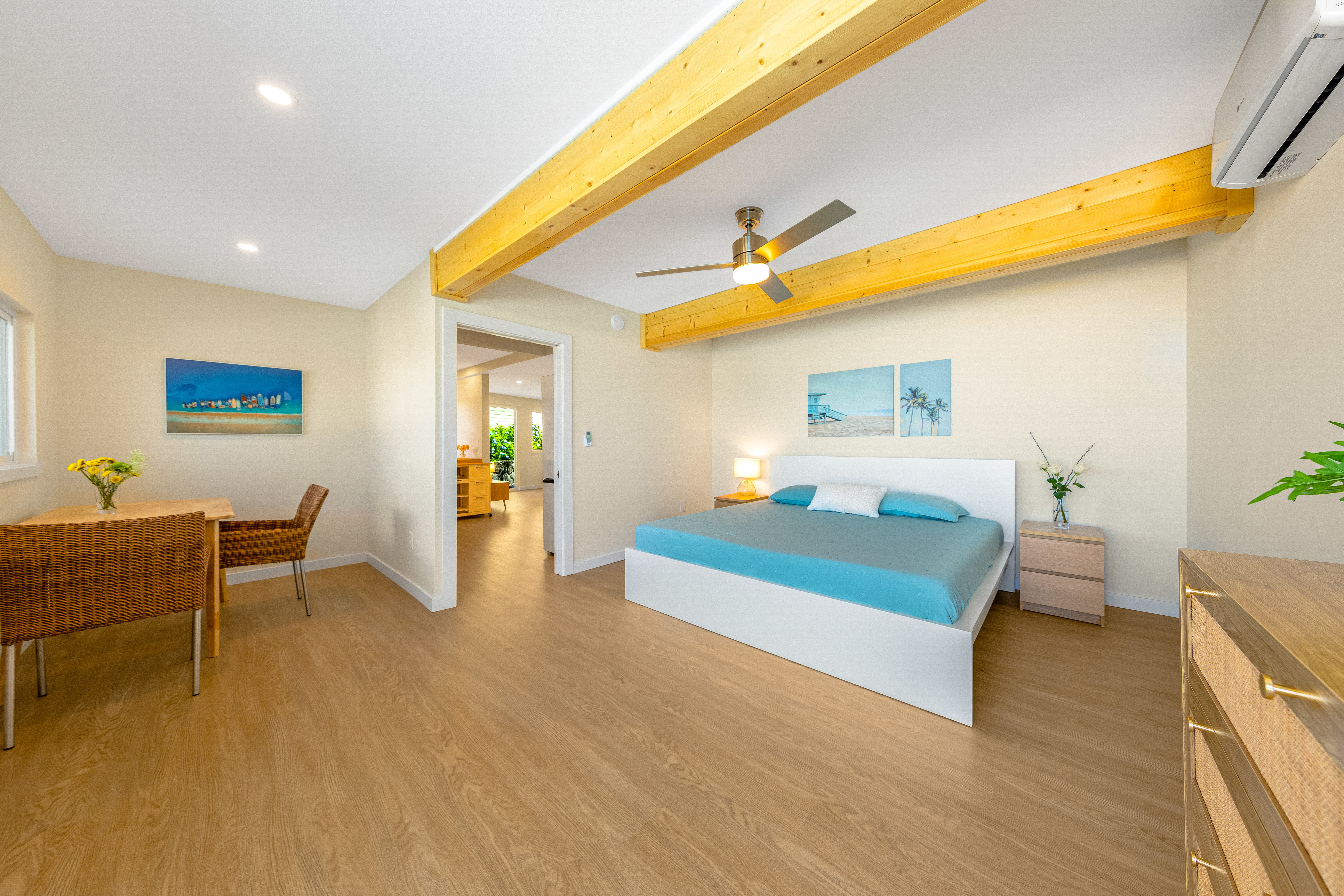 77-6472 Kilohana Street Kailua-Kona, HI 96740 - Photo 19 of 29 a bedroom with furniture and a wooden floor