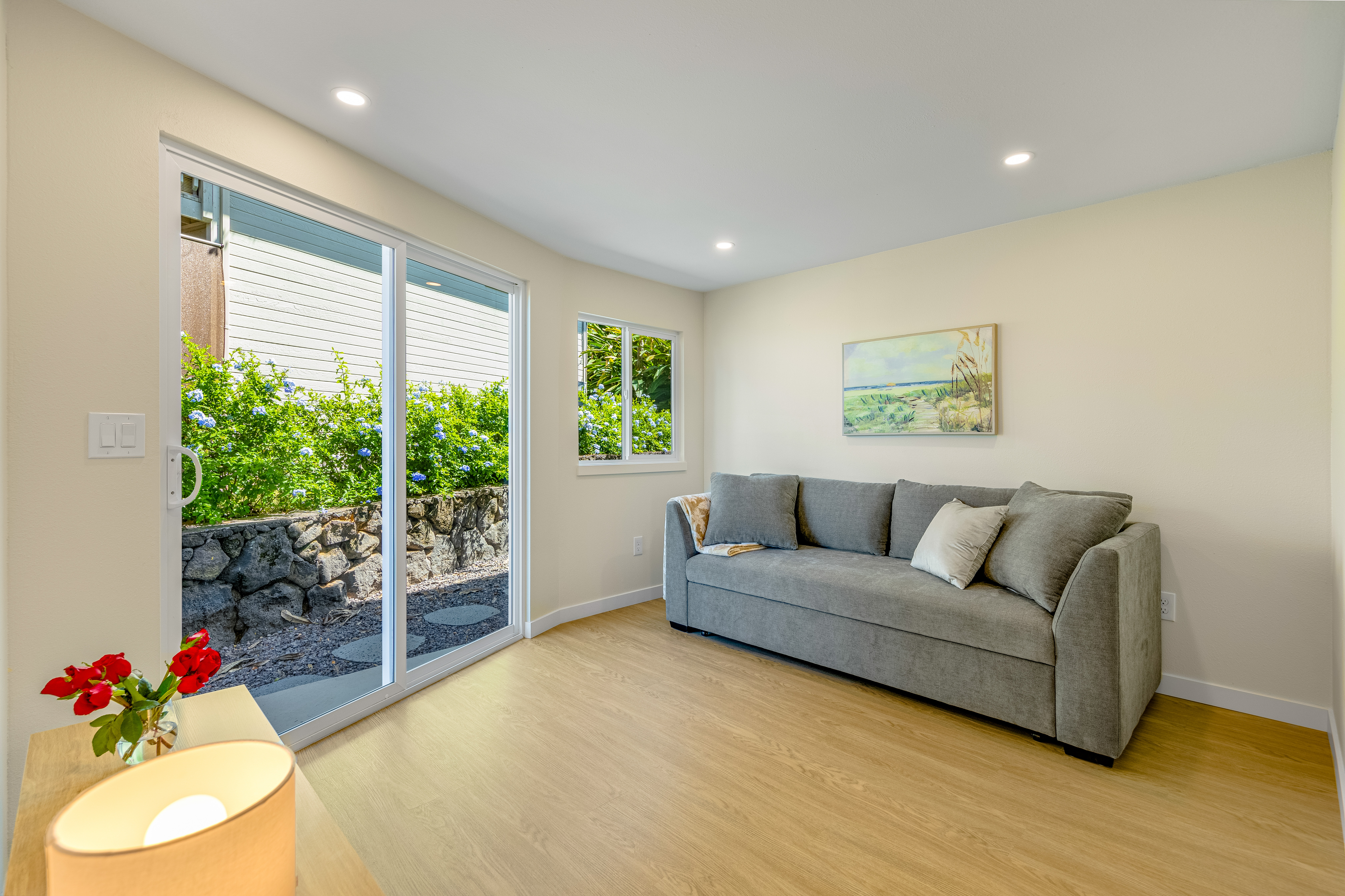 77-6472 Kilohana Street Kailua-Kona, HI 96740 - Photo 21 of 29 a living room with furniture and a large window