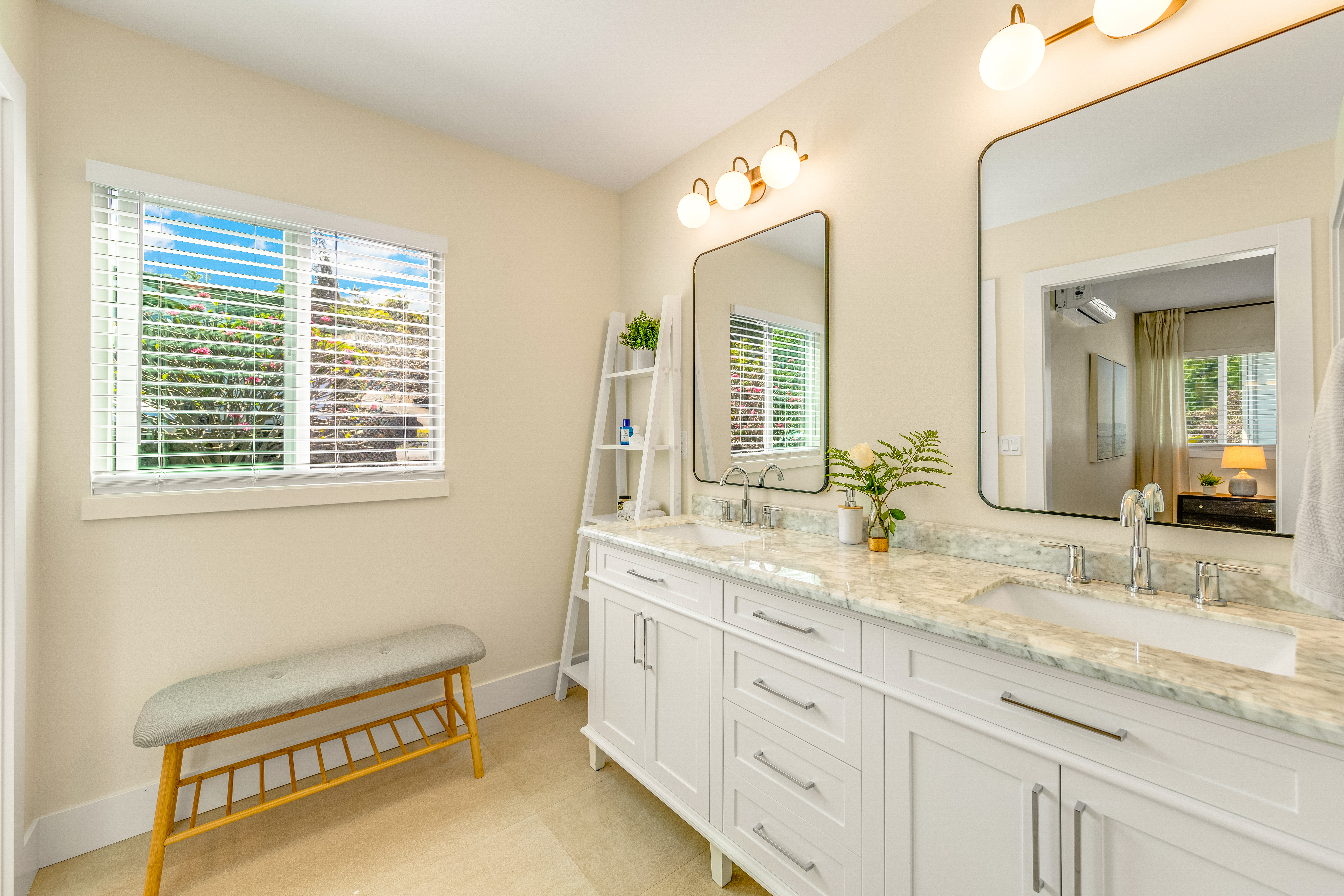77-6472 Kilohana Street Kailua-Kona, HI 96740 - Photo 9 of 29 a bathroom with a granite countertop sink and a mirror