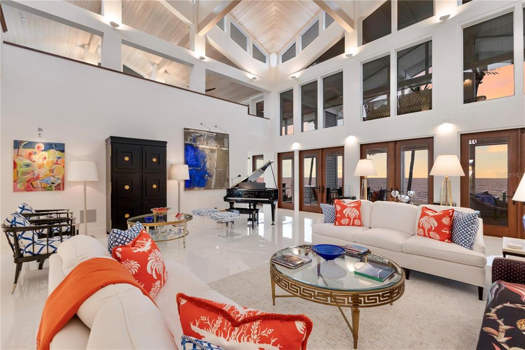 641 Boca Bay Drive Boca Grande, FL 33921 - Photo 5 of 74 a outdoor living space with furniture and a fireplace