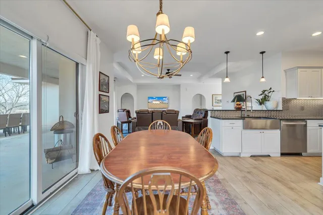 a stove top oven sitting inside of a kitchen