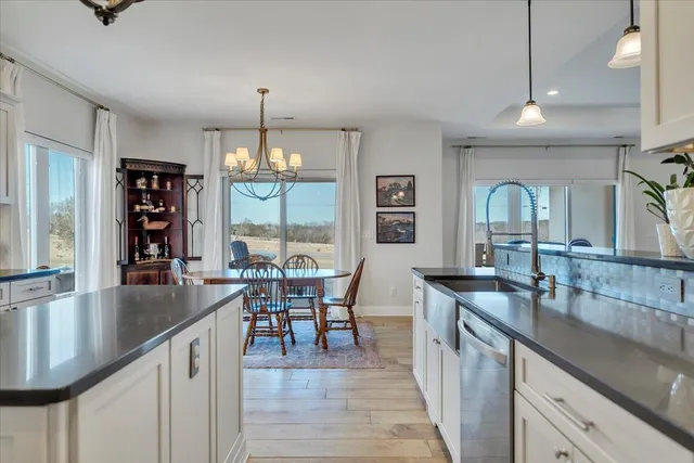 a bedroom with a bed couch and window