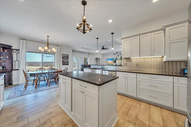 a bedroom with a bed and a mirror