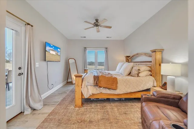 a bathroom with a tub and a shower