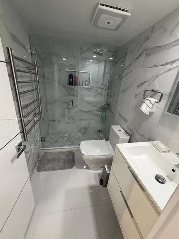 a view of a balcony with an ocean view