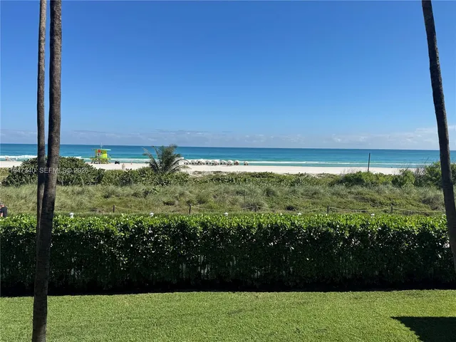 a view of a balcony with chairs