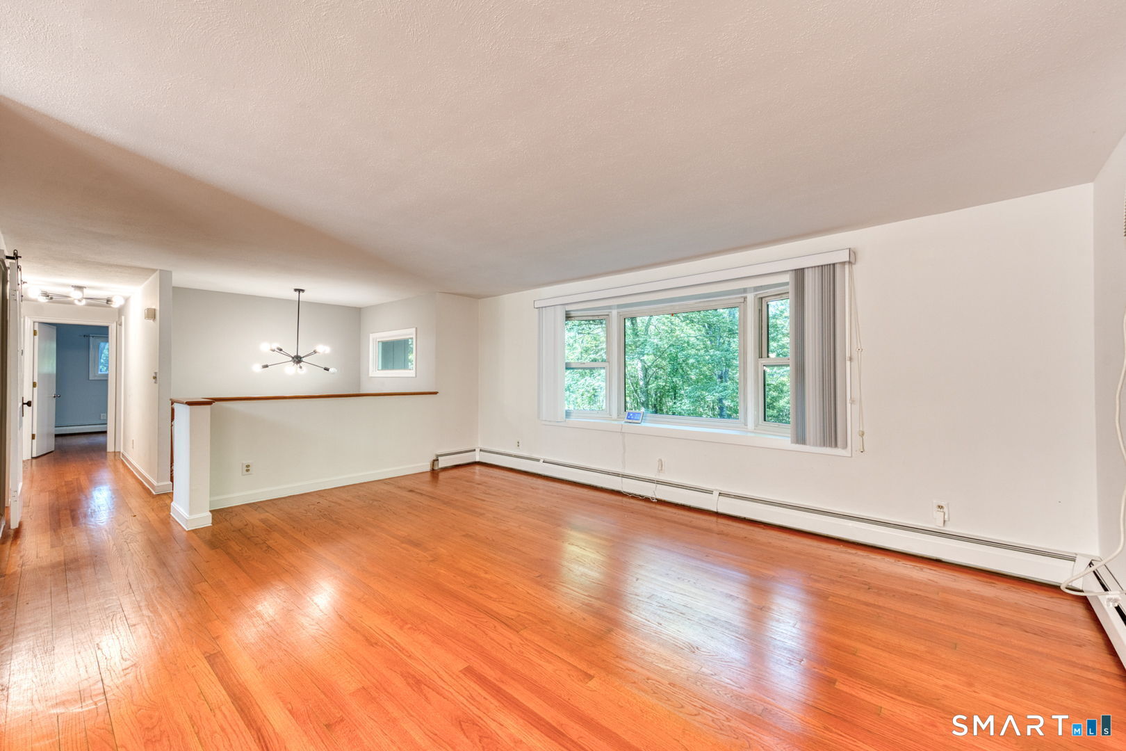 16 Westgate Lane Mansfield, CT 06268 - Photo 12 of 40 a view of a kitchen with wooden floor and a kitchen