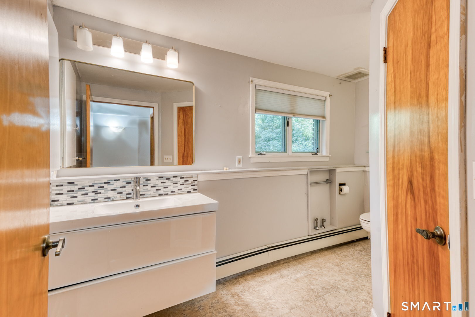 16 Westgate Lane Mansfield, CT 06268 - Photo 35 of 40 a view of a hallway with washer and dryer