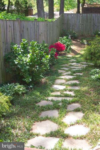 7926 Bainbridge Road Alexandria, VA 22308 - Photo 8 of 20 Nice Landscaping Throughout Yard