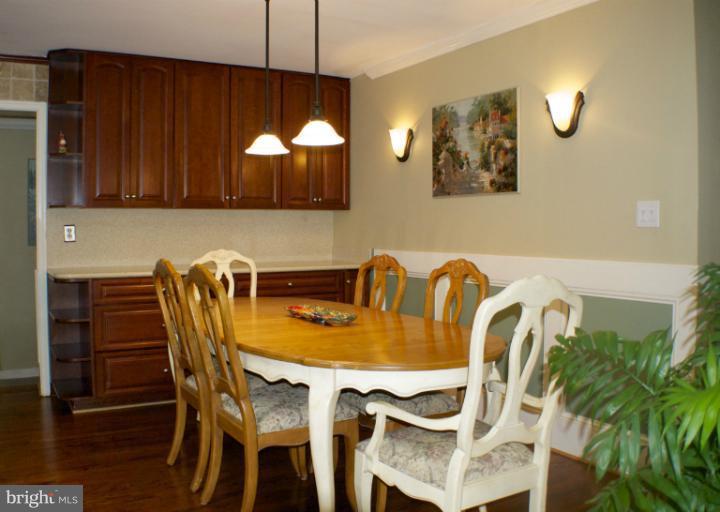 7926 Bainbridge Road Alexandria, VA 22308 - Photo 9 of 20 Dining Room with Custom Cabinetry and Lighting