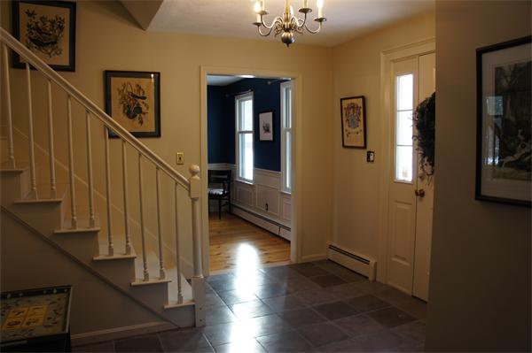 308 Berlin Road Bolton, MA 01740 - Photo 8 of 21 a view of a hallway view with wooden floor and staircase