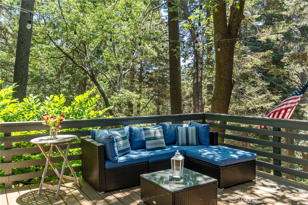 816 Fern Road Lake Arrowhead, CA 92385 - Photo 9 of 35 a outdoor living space with furniture and a potted plant