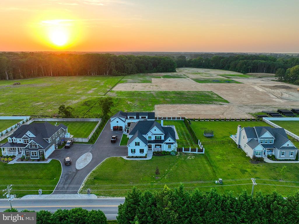 16516 New Road Lewes, DE 19958 - Photo 20 of 109 an aerial view of a house with garden space and outdoor seating