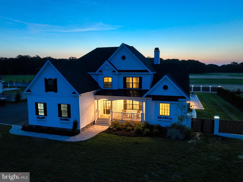 16516 New Road Lewes, DE 19958 - Photo 21 of 109 a front view of a house with a garden
