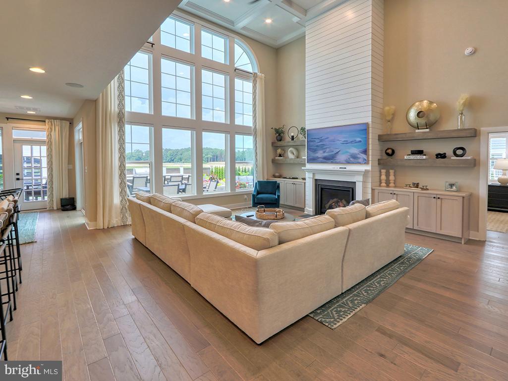 16516 New Road Lewes, DE 19958 - Photo 35 of 109 a living room with furniture and a fireplace