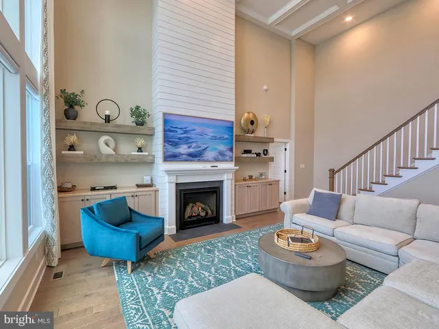 a bedroom with a bed and a ceiling fan