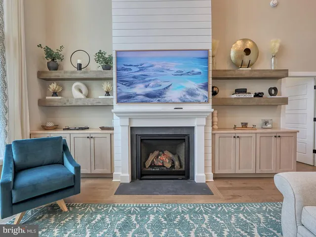 a spacious bathroom with a double vanity sink a mirror and a shower