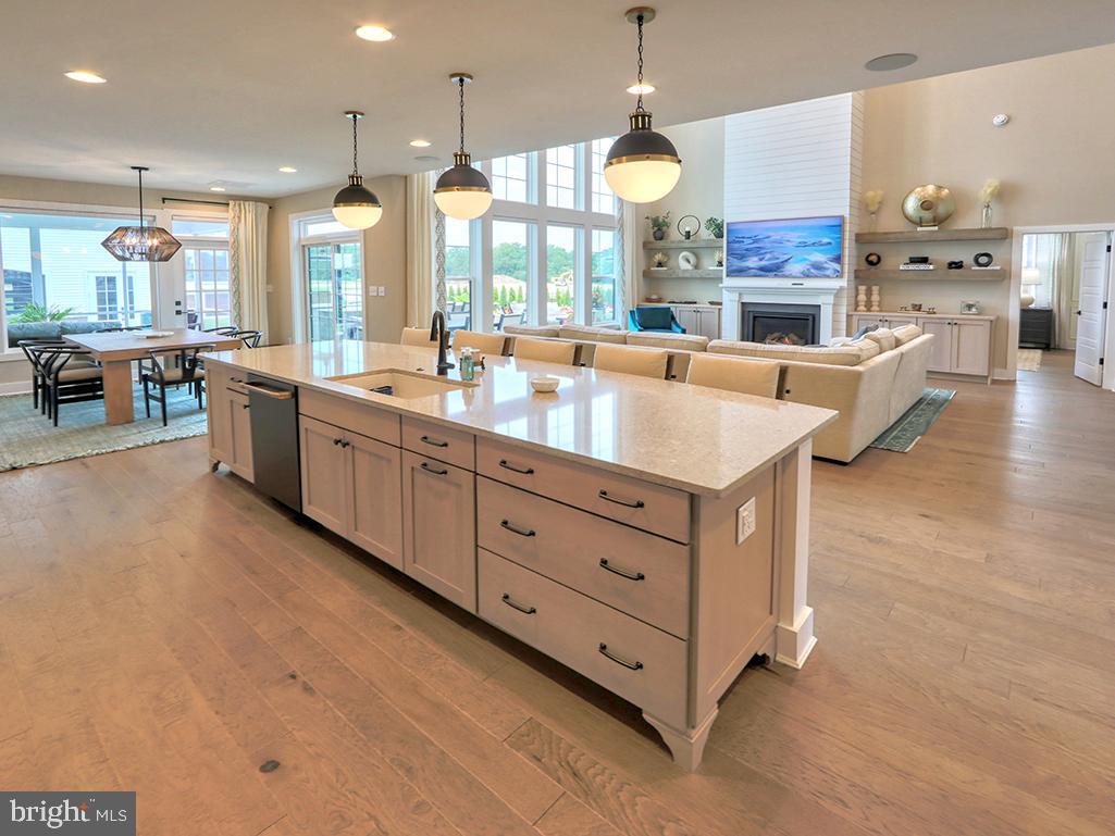 16516 New Road Lewes, DE 19958 - Photo 43 of 109 a large kitchen with a large counter top appliances and cabinets