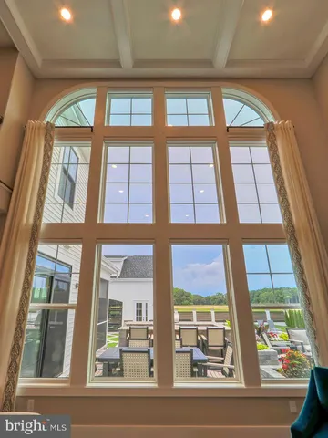 a view of an empty room with stairs