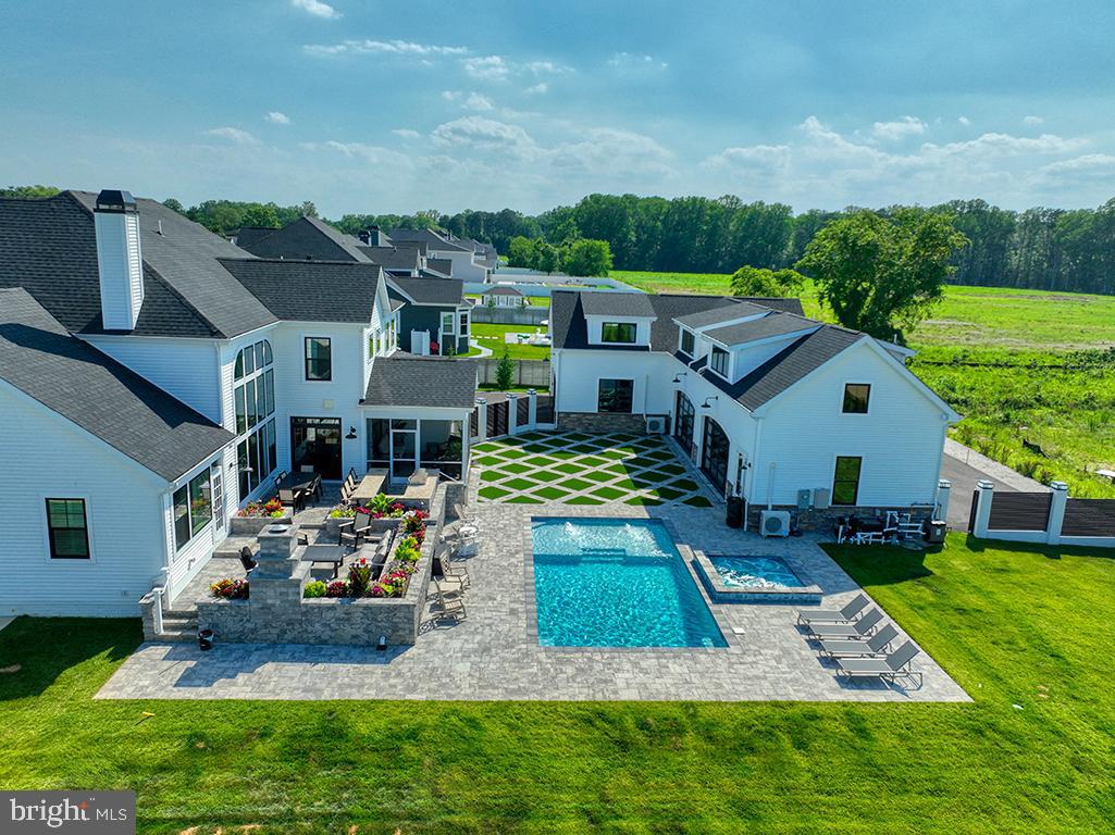 16516 New Road Lewes, DE 19958 - Photo 8 of 109 an aerial view of a house with garden